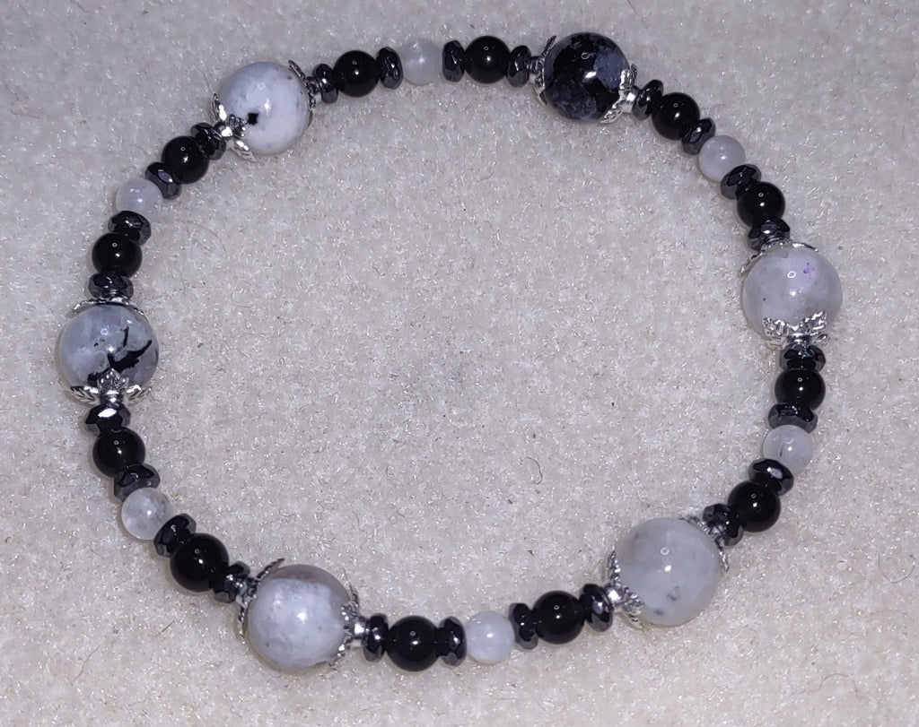 Bracelet: Moonstone with Black Tourmaline inclusions, hematite, and obsidian