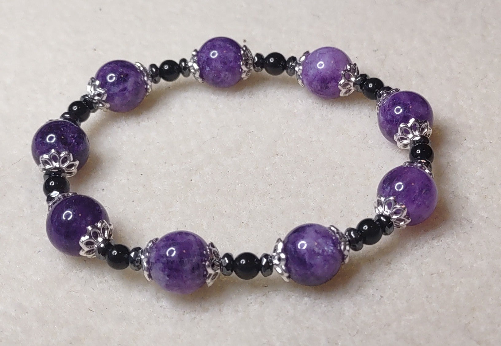 Bracelet: Amethyst, hematite, and Obsidian